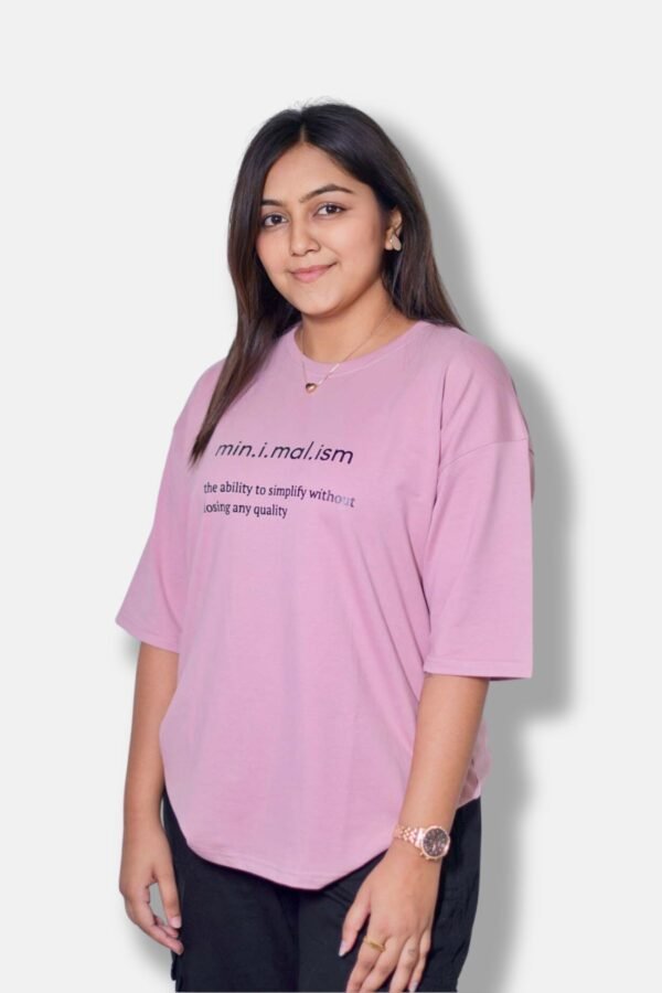 oversize t-shirt minimal oversize t-shirt model wearing oversize tshirt in simple pose minimal oversize clothing brand pastel pink color oversize tshirt